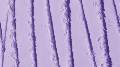 Top View of Violet Powder Surface with Dynamic Shadows