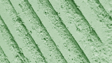 Evolving Shadows on Pale Green Powder Surface