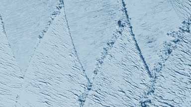 Pale Blue Powder Surface with Knife Trails and Light