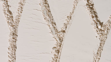Beige Powder Surface with Intersecting Knife Strokes
