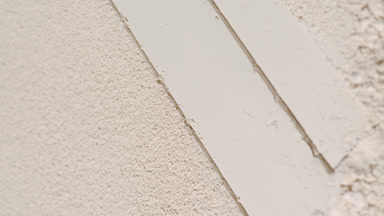 Beige Sifted Powder with Striped Imprints and Changing Shadows