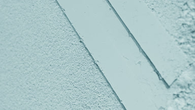 Pale Cyan Powder with Evolving Shadows and Striped Imprints