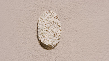 Beige Powder Texture Through Round Hole with Dynamic Light
