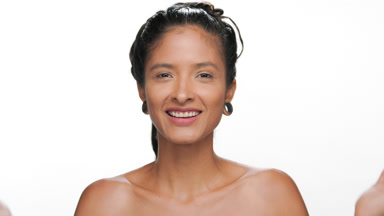 South american woman with light brown pure skin covers face