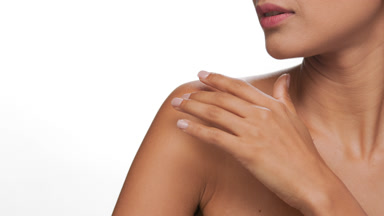 Latin woman with caramel skin highlights nourished skin beauty