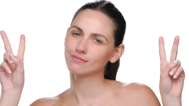 Young fair-skinned latina making air quotes on white background