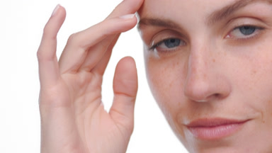 Fair-skinned beauty with freckles highlights balanced skin tone